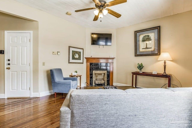 518 W Strong St Unit A & B, Pensacola, FL 32501 - living area featuring a fireplace, baseboards, wood finished floors, and ceiling fan