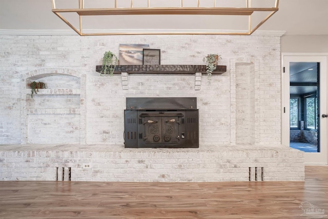 room details featuring wood-type flooring and ornamental molding