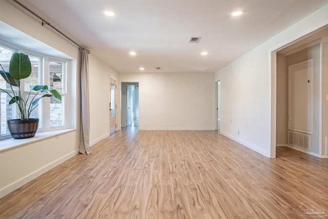 empty room featuring light hardwood / wood-style floors