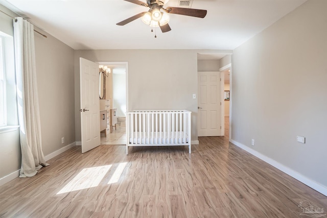 unfurnished bedroom featuring ceiling fan and light hardwood / wood-style flooring