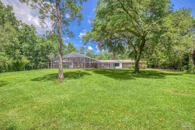 1213 Tecumseh Pl, Pensacola, FL 32514 - view of green lawn featuring glass enclosure