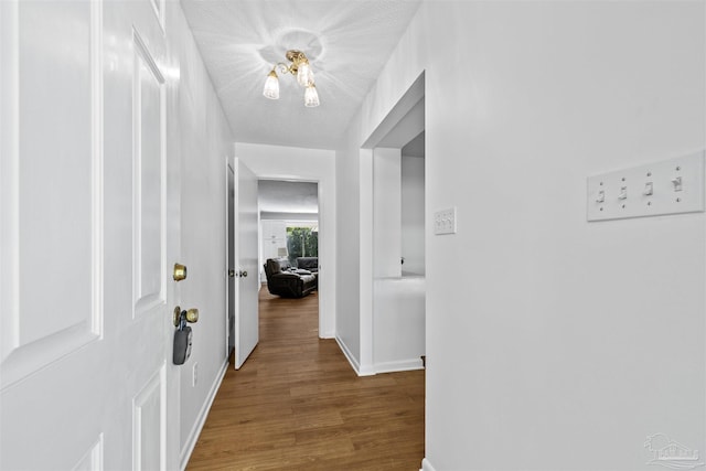 1213 Tecumseh Pl, Pensacola, FL 32514 - corridor featuring wood finished floors and baseboards