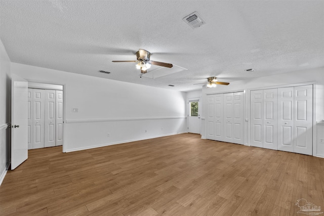 1213 Tecumseh Pl, Pensacola, FL 32514 - unfurnished living room featuring a ceiling fan, a textured ceiling, and light wood-type flooring