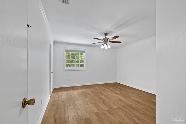 1213 Tecumseh Pl, Pensacola, FL 32514 - unfurnished room featuring ornamental molding, a ceiling fan, and light wood-type flooring