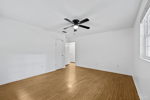 1213 Tecumseh Pl, Pensacola, FL 32514 - unfurnished room with wood finished floors and a ceiling fan