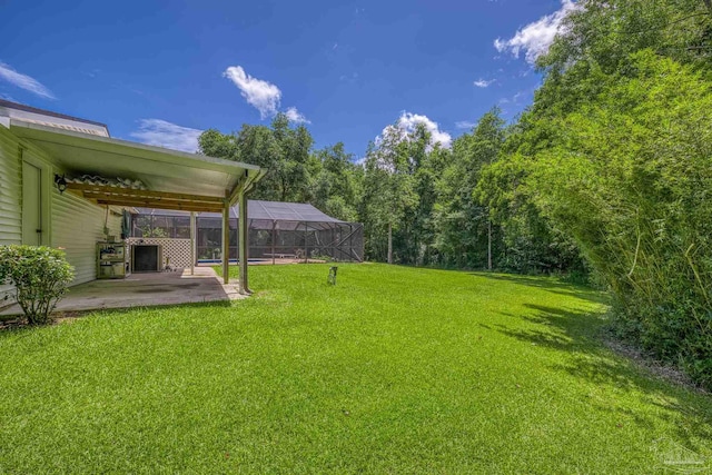1213 Tecumseh Pl, Pensacola, FL 32514 - view of grassy yard featuring a patio and a lanai