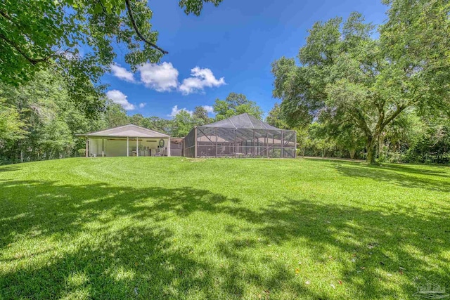 1213 Tecumseh Pl, Pensacola, FL 32514 - view of green lawn featuring glass enclosure