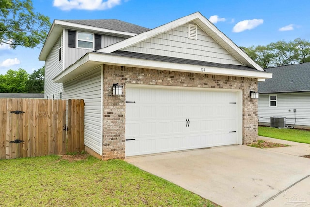 124 Polo Ter, Pensacola, FL 32534 - view of side of home with central AC unit, brick siding, a shingled roof, and concrete driveway