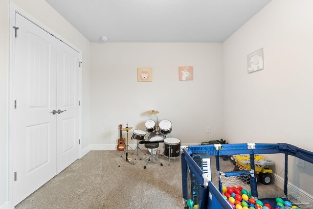 124 Polo Ter, Pensacola, FL 32534 - carpeted bedroom featuring baseboards and a closet