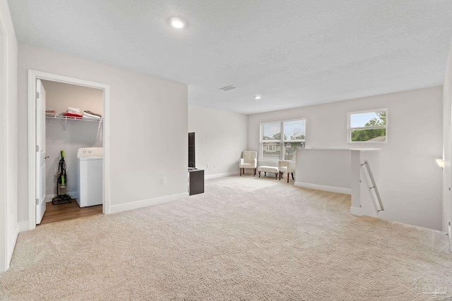 124 Polo Ter, Pensacola, FL 32534 - empty room with washer and dryer, carpet flooring, baseboards, a textured ceiling, and recessed lighting