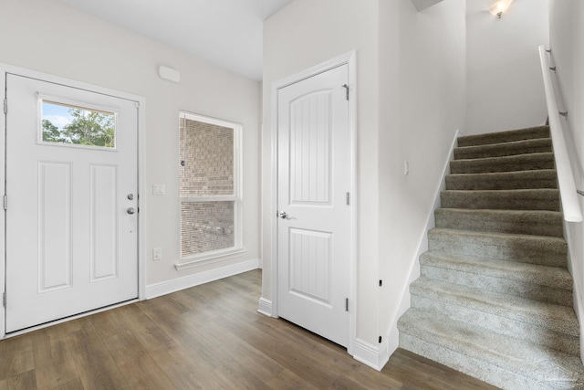 124 Polo Ter, Pensacola, FL 32534 - foyer entrance featuring stairs, wood finished floors, and baseboards