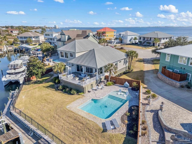 drone / aerial view featuring a water view