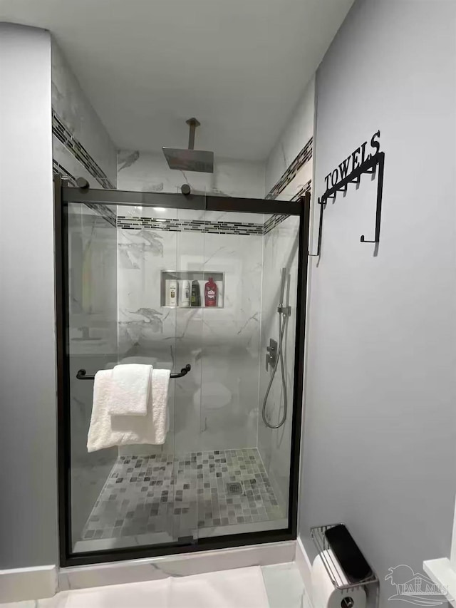 bathroom with an enclosed shower