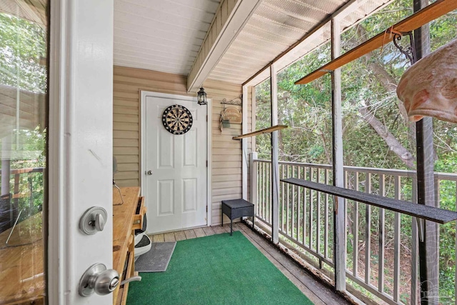 sunroom / solarium with beam ceiling