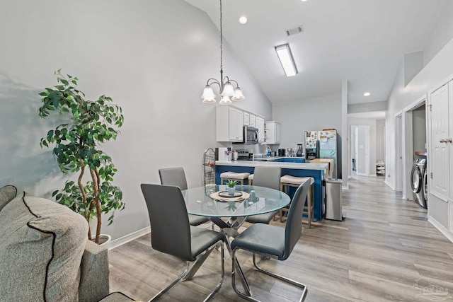 dining room featuring light wood-type flooring, baseboards, a chandelier, recessed lighting, and high vaulted ceiling