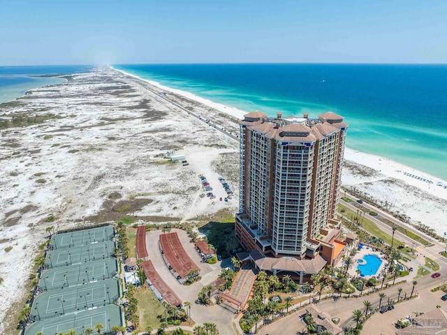 bird's eye view with a beach view and a water view