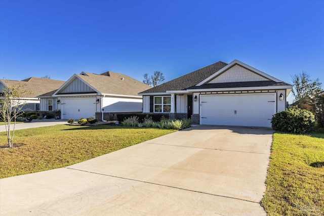 view of front of house with a garage and a front lawn