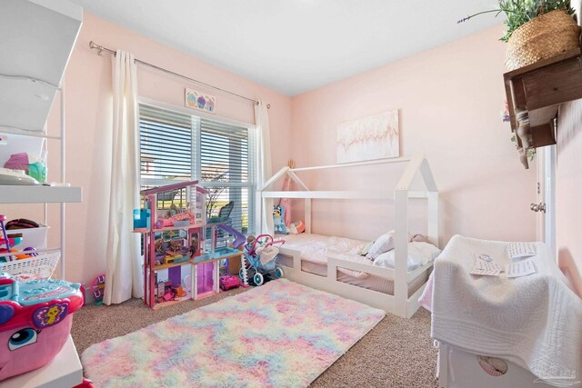 bedroom featuring carpet flooring