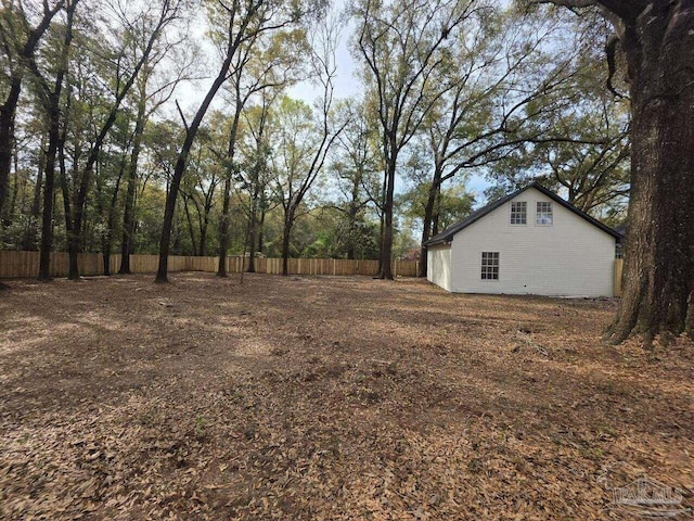 5674 Windsong Dr, Milton, FL 32570 - view of yard featuring fence