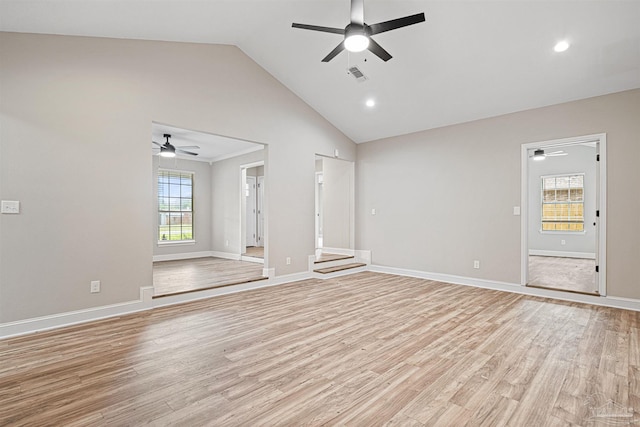 5674 Windsong Dr, Milton, FL 32570 - unfurnished living room with a ceiling fan, light wood-type flooring, baseboards, recessed lighting, and high vaulted ceiling