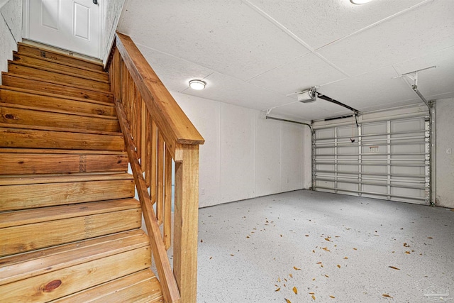 5674 Windsong Dr, Milton, FL 32570 - garage featuring a garage door opener