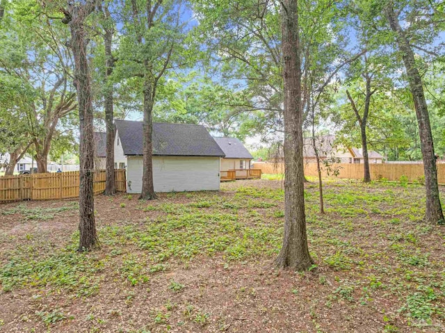 5674 Windsong Dr, Milton, FL 32570 - view of yard with fence and a wooden deck