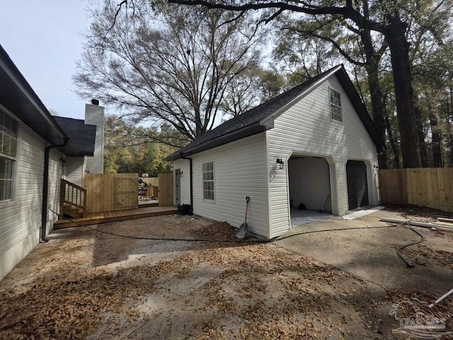 5674 Windsong Dr, Milton, FL 32570 - garage featuring fence
