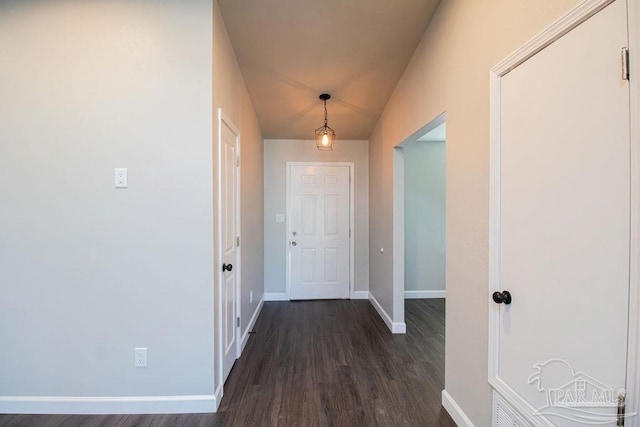 hallway featuring dark hardwood / wood-style floors