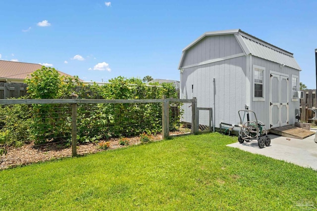 view of outbuilding with a lawn