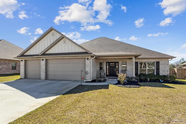 view of front of home with a garage, brick siding, driveway, board and batten siding, and a front yard