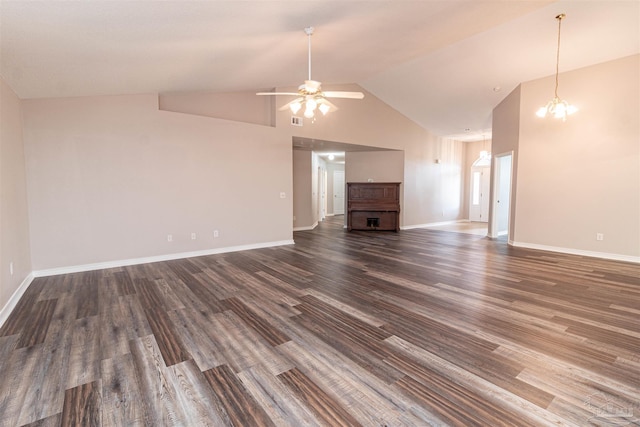 unfurnished living room with ceiling fan, wood finished floors, high vaulted ceiling, and baseboards