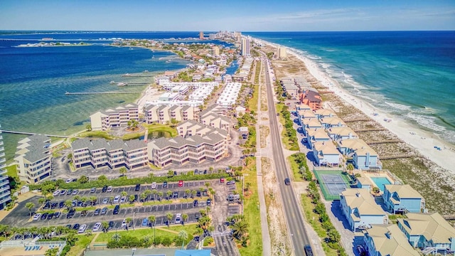 bird's eye view with a water view and a view of the beach