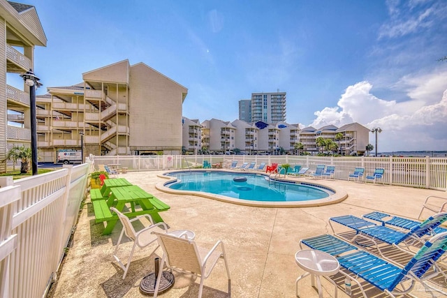 view of pool with a patio area