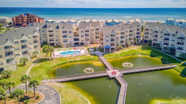 birds eye view of property featuring a water view