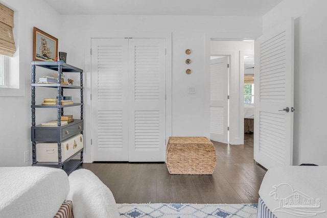 6050 Cheyenne Dr, Milton, FL 32570 - bedroom with wood finished floors and a closet