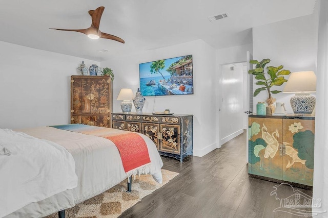 6050 Cheyenne Dr, Milton, FL 32570 - bedroom with wood finished floors, ceiling fan, and baseboards