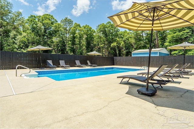 6050 Cheyenne Dr, Milton, FL 32570 - view of swimming pool with a patio area and a fenced backyard