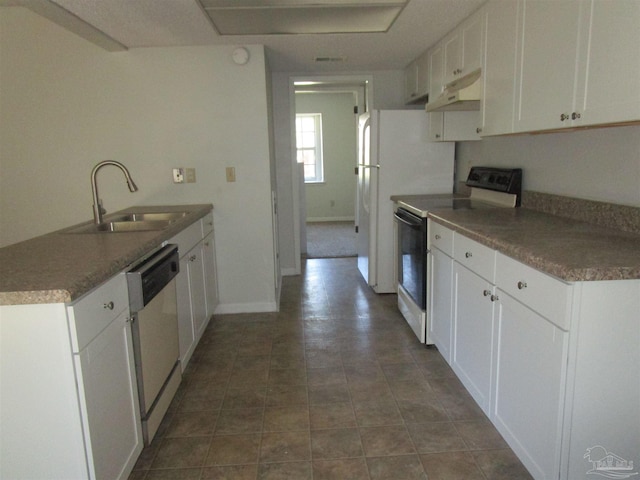 kitchen featuring white appliances, sink, and white cabinets