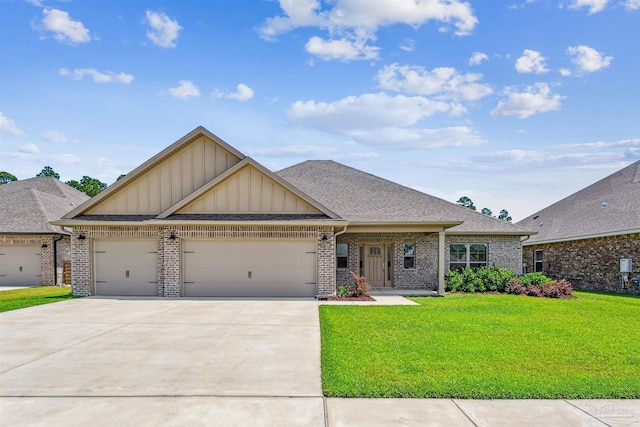 view of front of home featuring a garage and a front yard