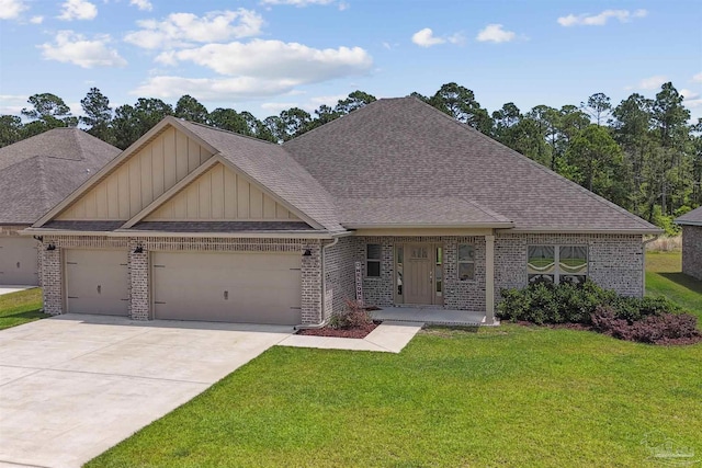 craftsman house featuring a garage and a front lawn