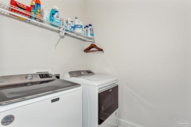 laundry area with washer and clothes dryer