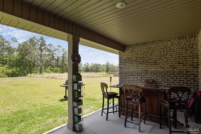 view of patio with a bar