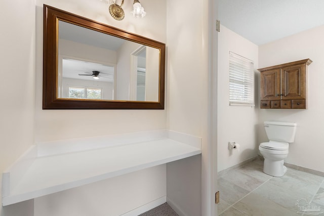 bathroom featuring tile patterned floors, ceiling fan, and toilet