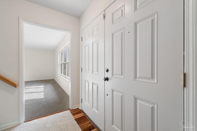 hallway featuring hardwood / wood-style flooring