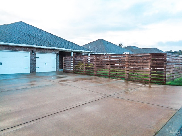 view of patio with a garage