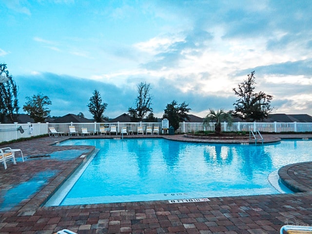 view of pool featuring a patio area