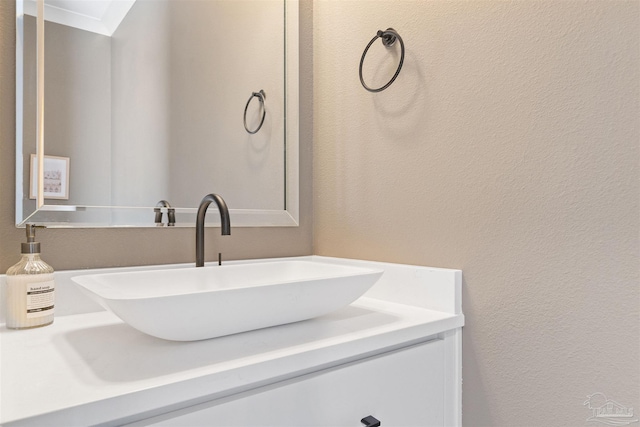 13844 Red Drum Ct, Perdido Key, FL 32507 - bathroom featuring vanity and a textured wall
