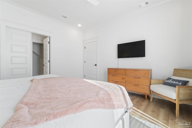 13844 Red Drum Ct, Perdido Key, FL 32507 - bedroom featuring wood finished floors, crown molding, and recessed lighting