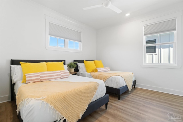 13844 Red Drum Ct, Perdido Key, FL 32507 - bedroom with wood finished floors, ceiling fan, and recessed lighting