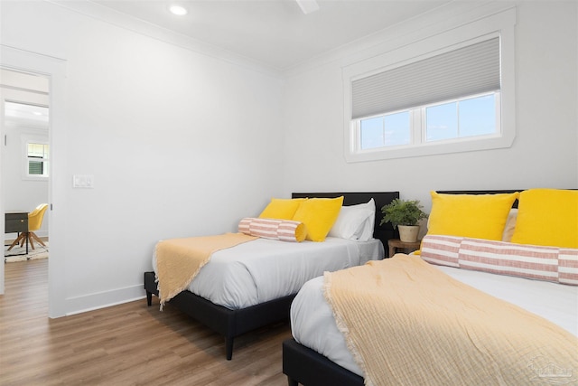 13844 Red Drum Ct, Perdido Key, FL 32507 - bedroom with wood finished floors, crown molding, and recessed lighting